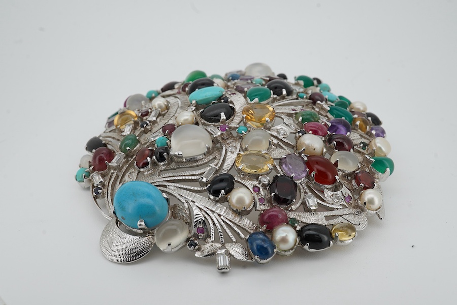 A large recent white metal (stamped 92.5) and multi gen set circular brooch, 89mm.